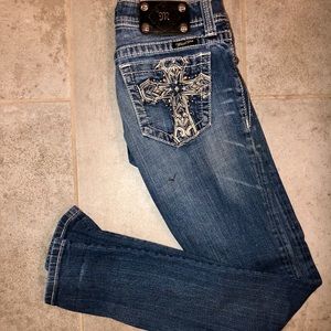 MissMe across Jeans.